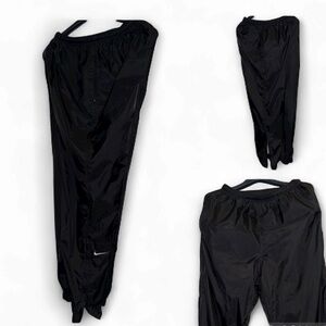 Nike cotton lined nylon zip ankle joggers -black with white Swoosh